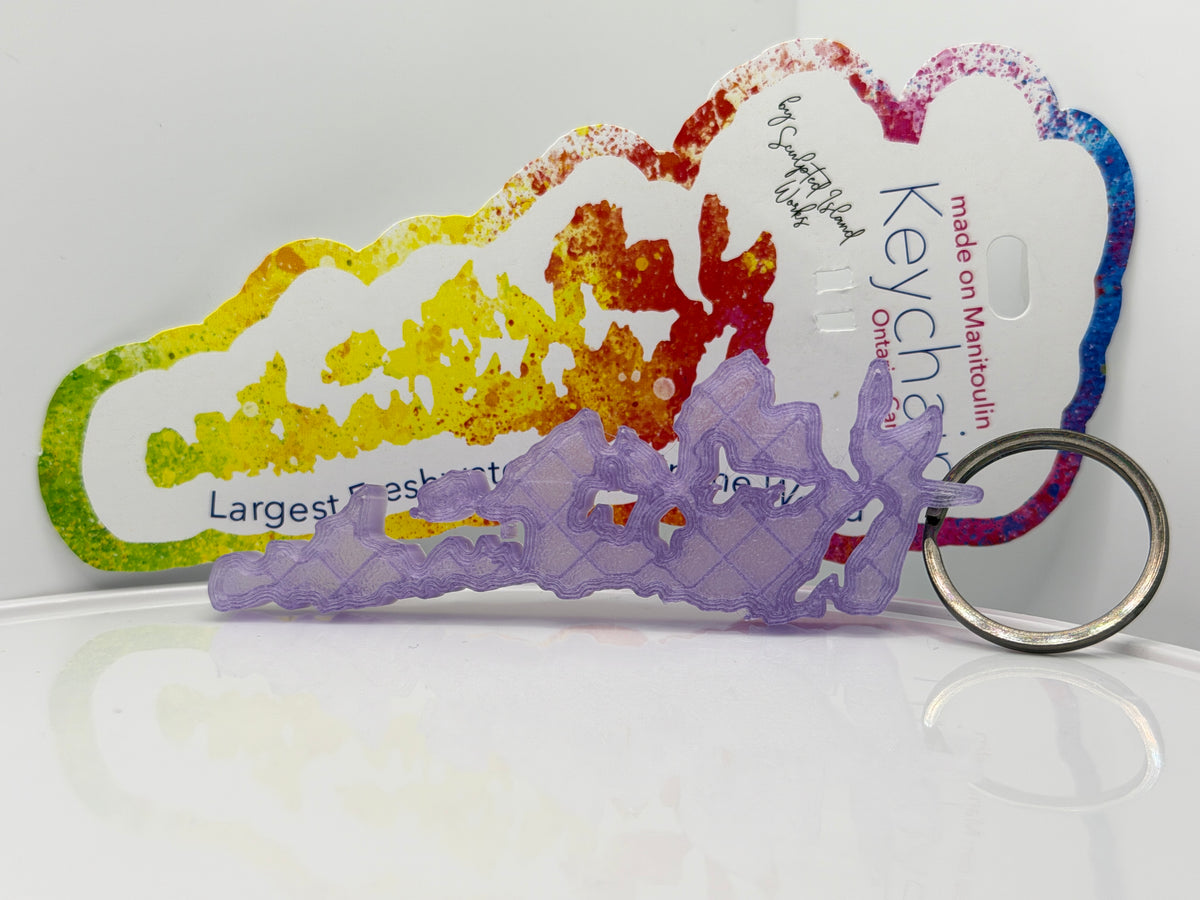 Translucent lilac Manitoulin Island key chain on its display card