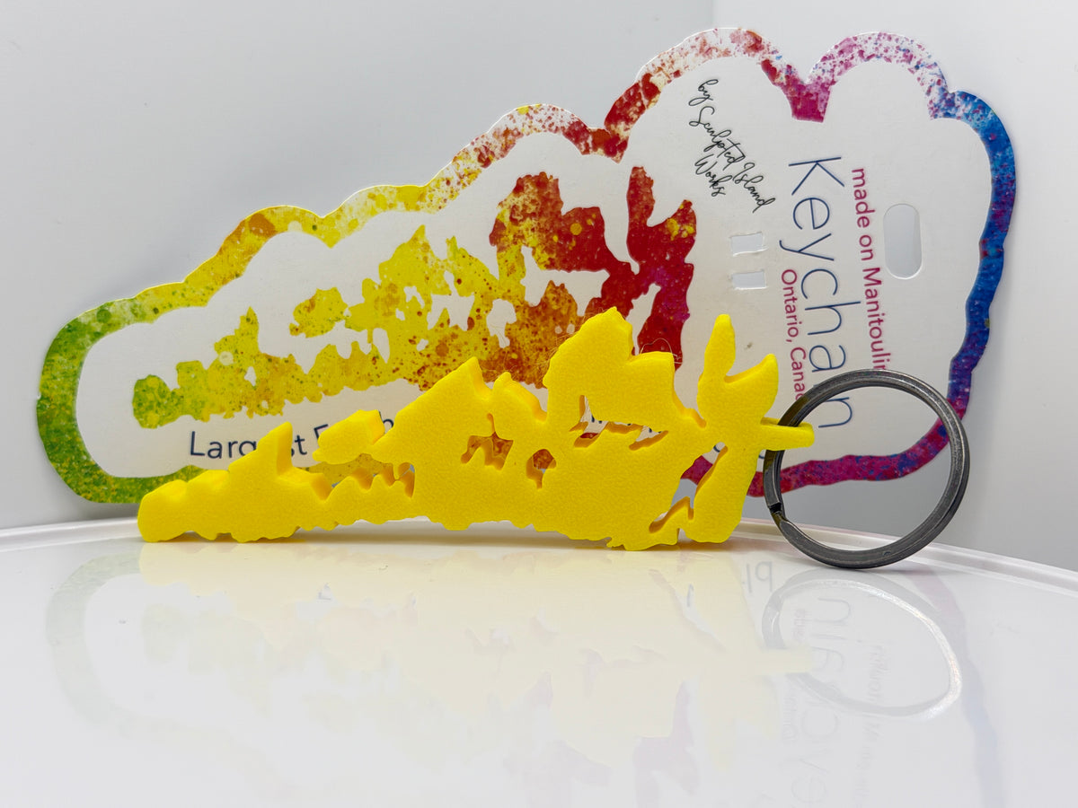 Sunny yellow Manitoulin Island key chain on its display card