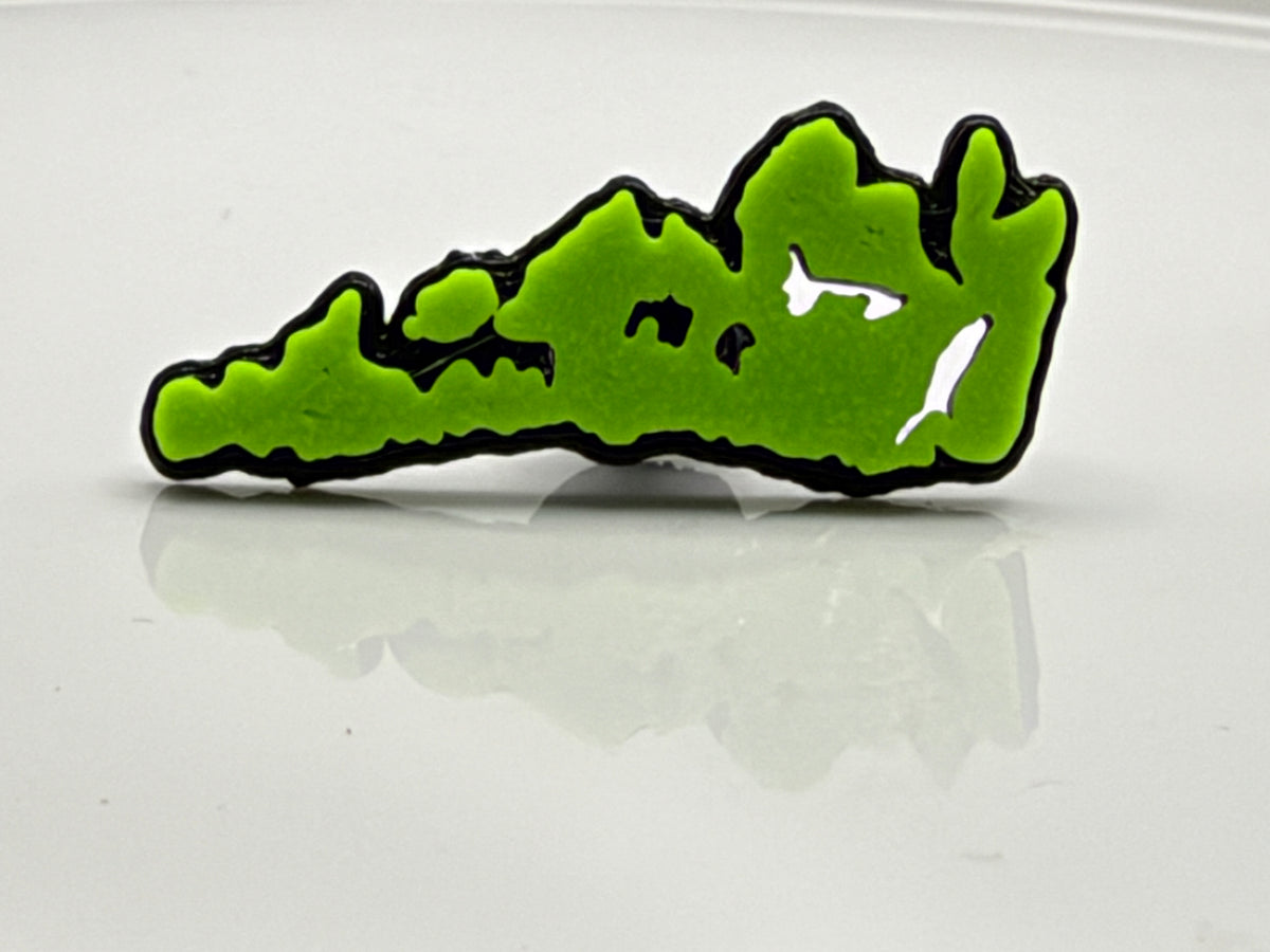 Lime green Manitoulin Island shoe charm outside its bag